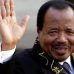 FILE PHOTO: Cameroon&rsquo;s President Paul Biya waves as he leaves following a meeting at the Elysee Palace in Paris